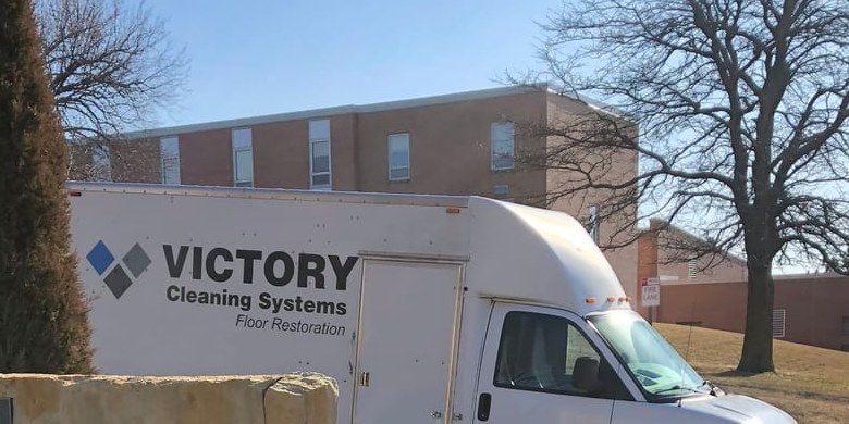 Victory Cleaning Systems box truck parked at a job